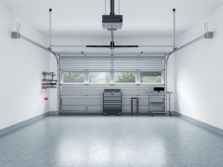 Modern Custom Garage Makeover in Colleyville, TX – Sleek Storage & Smart Solutions Bright, spacious Colleyville garage with custom cabinetry, tool organization, and modern epoxy-coated flooring